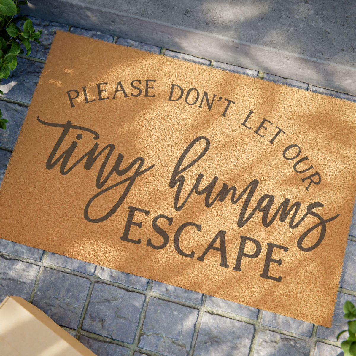 Doormat — "Please Don’t Let Our Tiny Humans Escape" Funny Welcome Mat for Families & Pet Owners