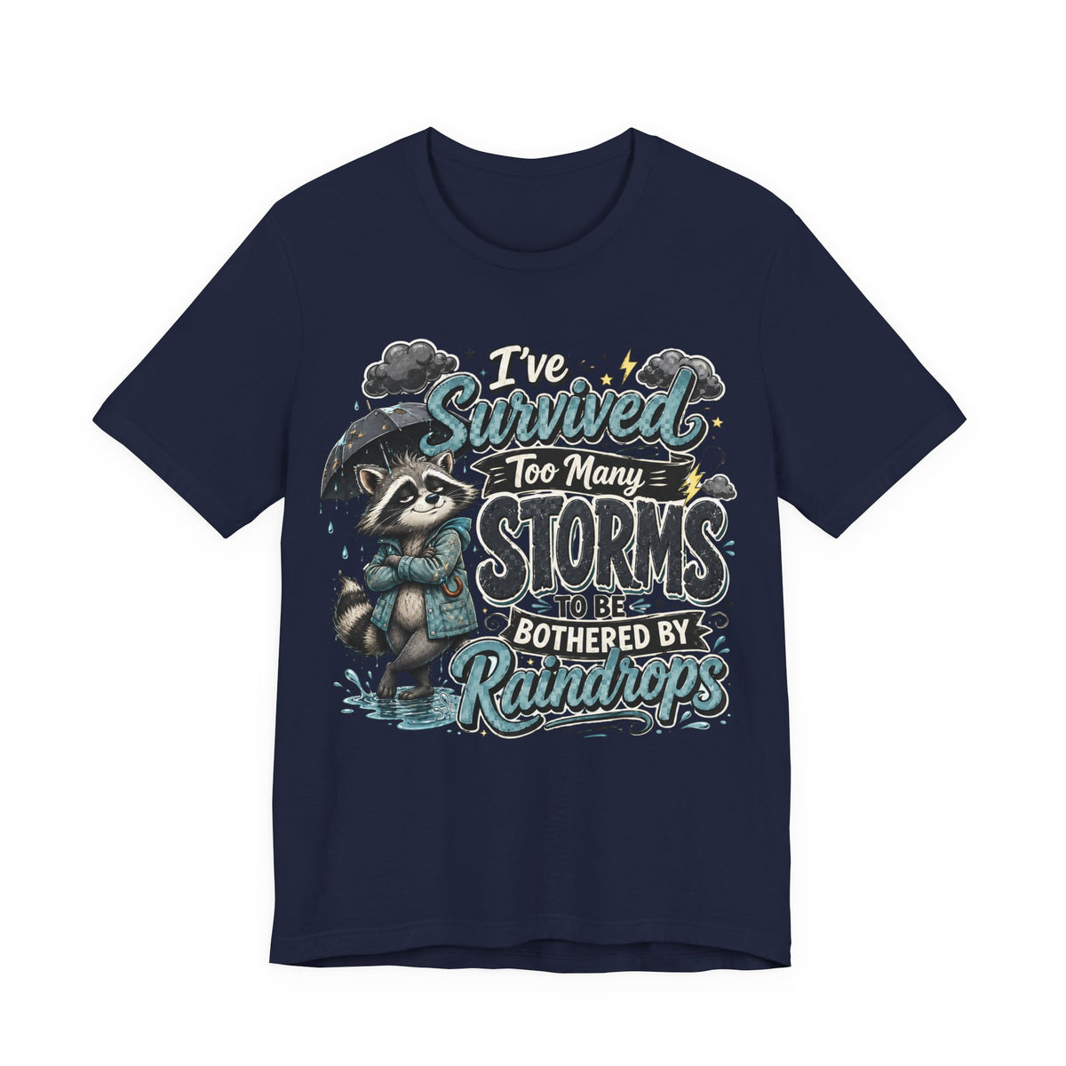 Survived Too Many Storms Tee — Inspirational Raccoon Rainy Day Graphic T-Shirt