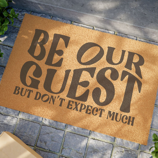Be Our Guest Doormat — Funny Welcome Cockney Coir Door Mat ("Be Our Guest But Don’t Expect Much")
