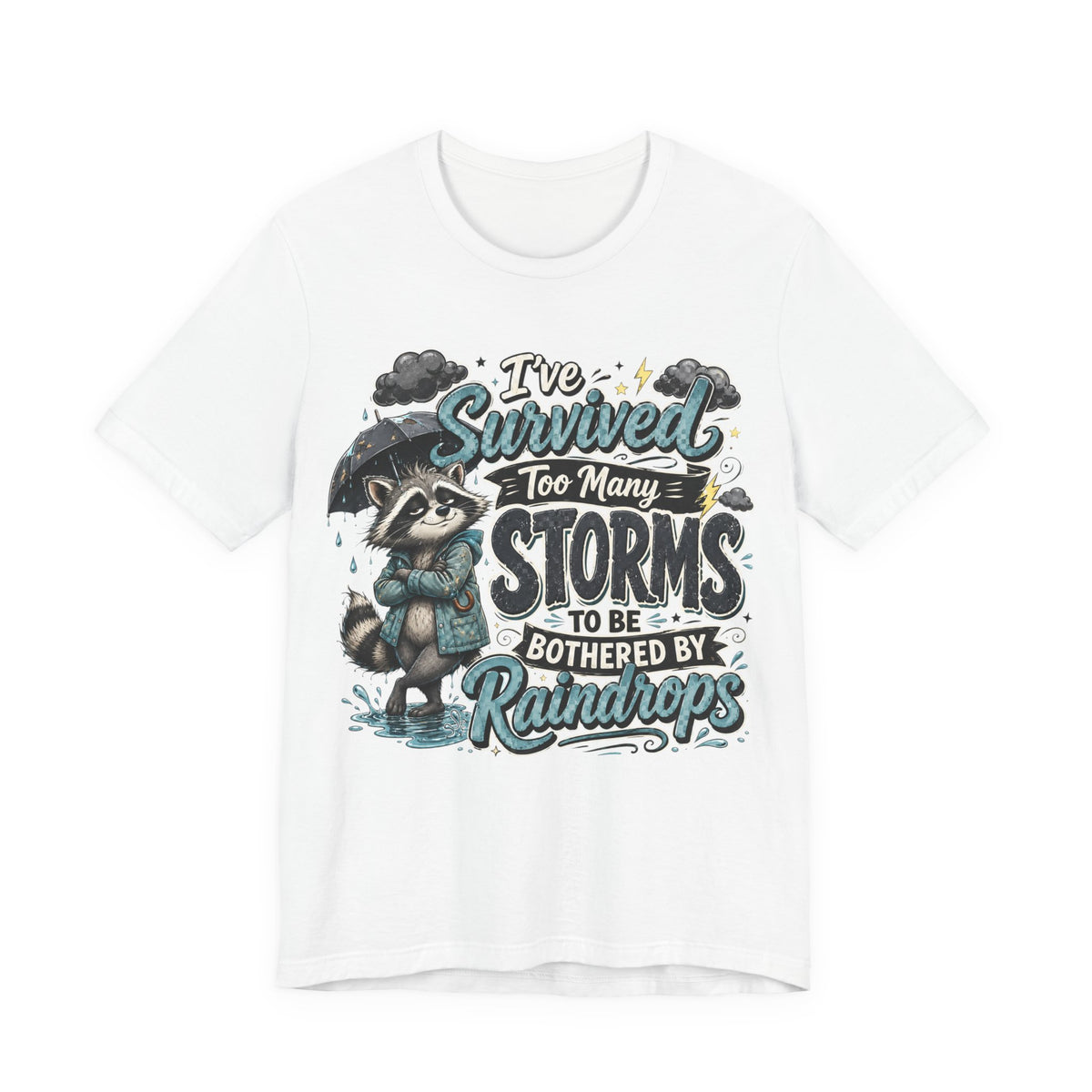 Survived Too Many Storms Tee — Inspirational Raccoon Rainy Day Graphic T-Shirt