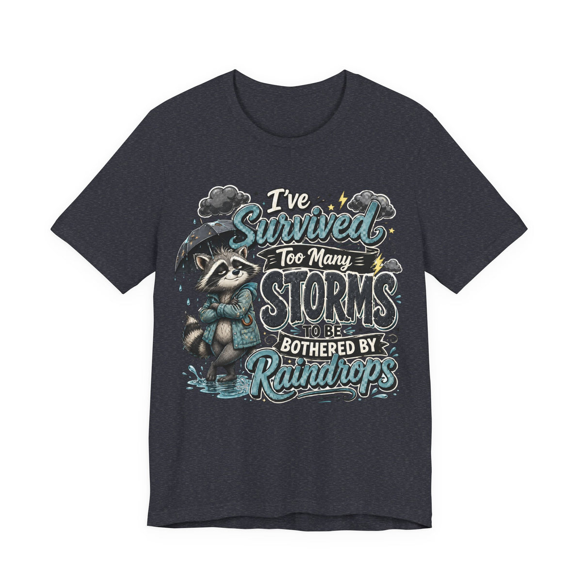 Survived Too Many Storms Tee — Inspirational Raccoon Rainy Day Graphic T-Shirt